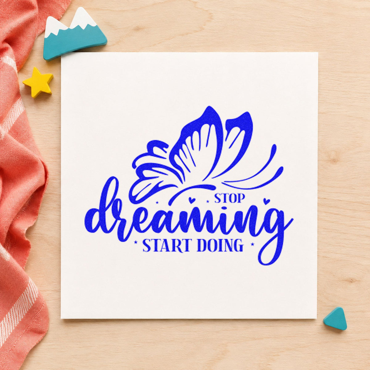 Stop Dreaming Start Doing Butterfly craft stamp imprinted in blue ink on paper, a design suited to framed test kitchen.