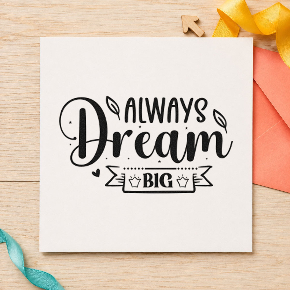 Always Dream Big Crown craft stamp imprint in black ink on a handmade project, one idea being favor box gift tags.