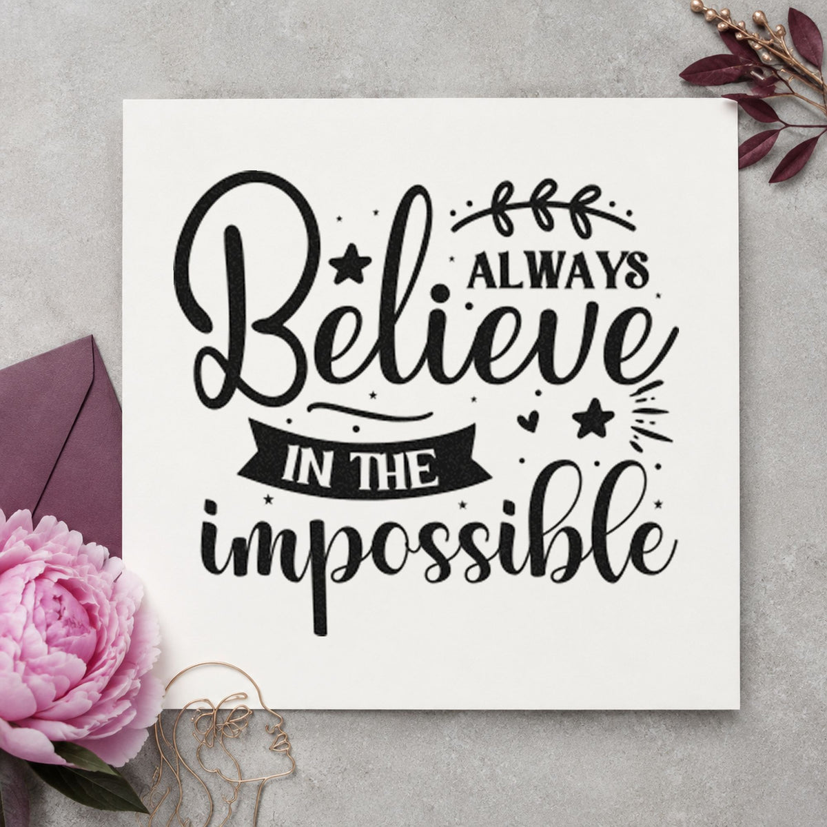 Always Believe In Impossible craft stamp imprint in black ink on a handmade project, one idea being demo kit gift tags.