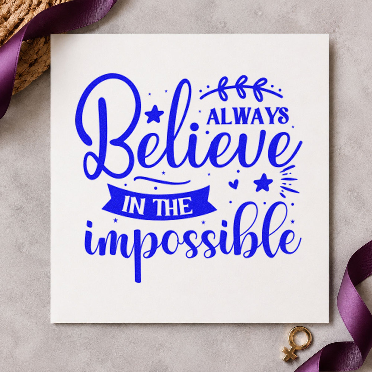 Always Believe In Impossible craft stamp in blue ink on cardstock, an easy option for volunteer vest printing.