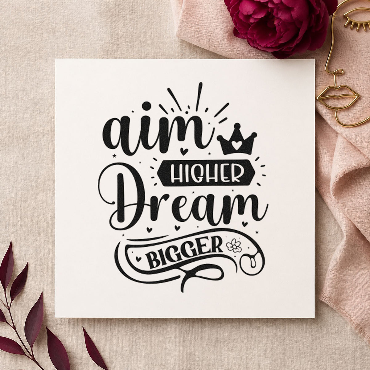 Aim Higher Dream Bigger Crown craft stamp imprint in black ink on a handmade project, one idea being shooting gift tags.