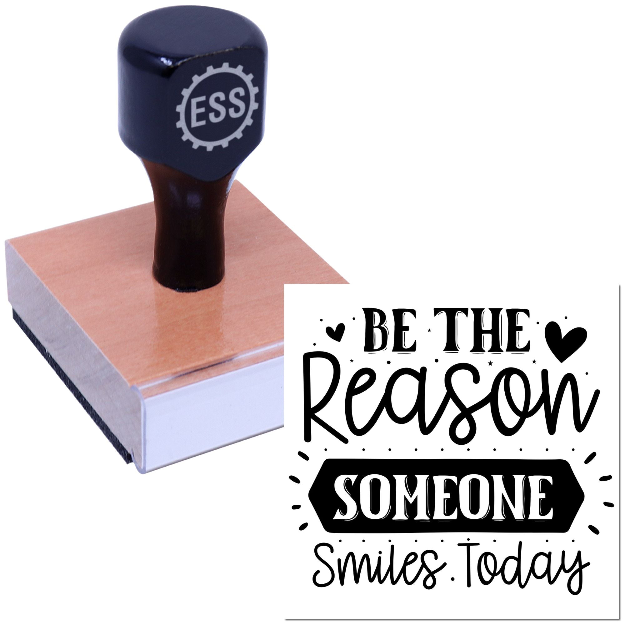 Dark blue ESS rubber stamp on a wooden block next to a black Be the Reason Someone Smiles Today seal design.