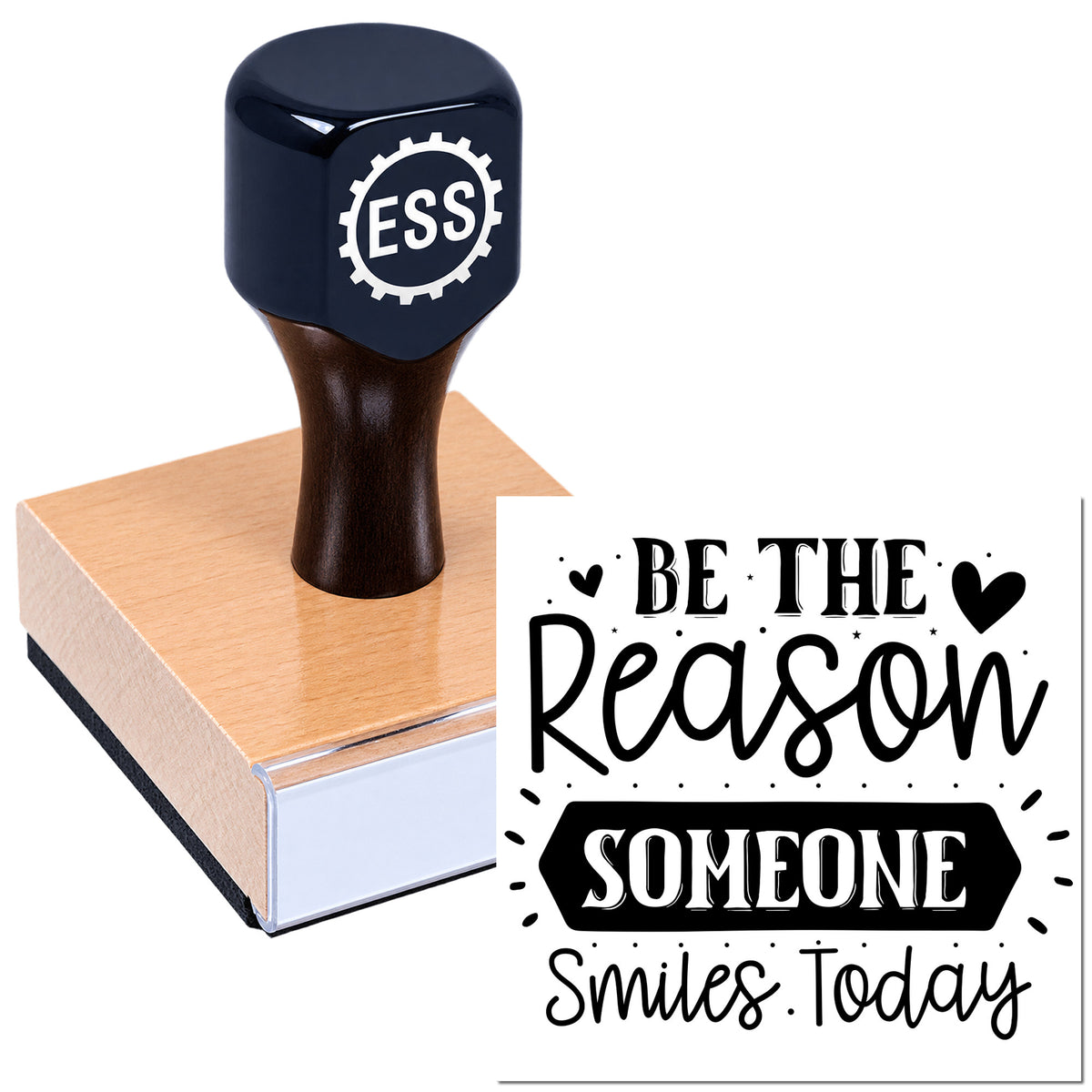 Dark blue ESS rubber stamp on a wooden block next to a black "Be the Reason Someone Smiles Today" seal design.