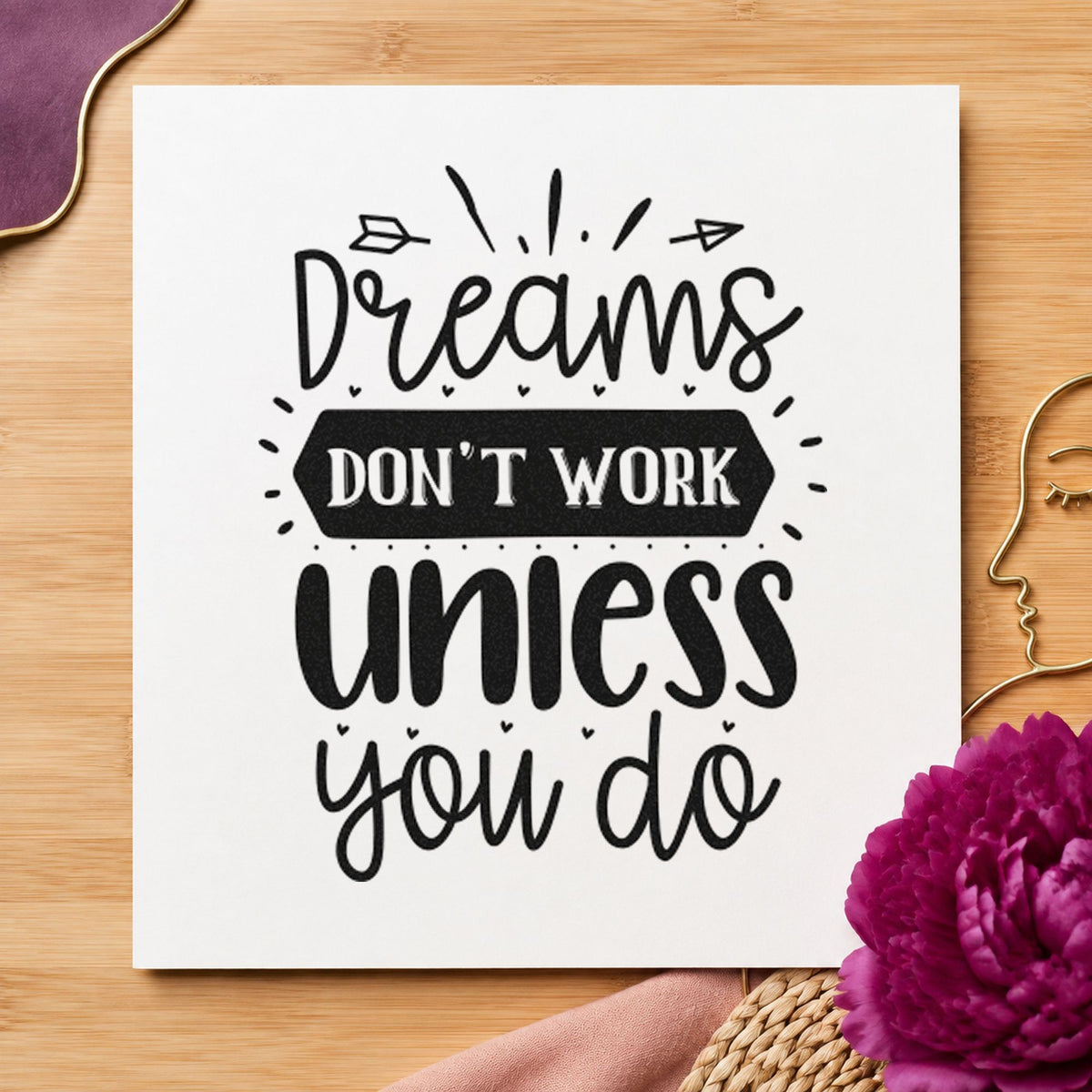 Dreams Don't Work Unless You Do craft stamp imprint in black ink on a handmade project, one idea being tester gift tags.