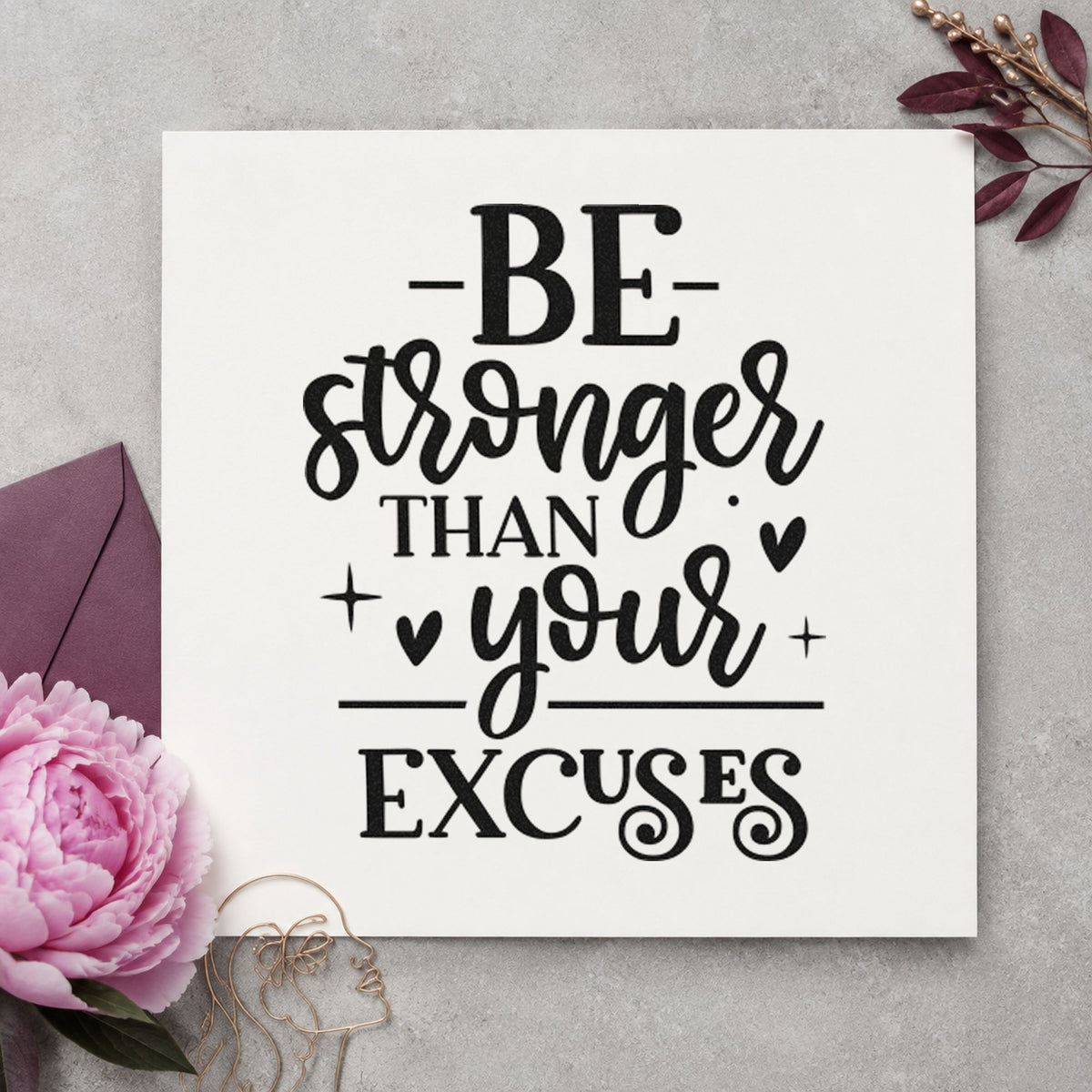 Be Stronger Than Your Excuses craft stamp imprint in black ink on a handmade project, one idea being chalk bag gift tags.