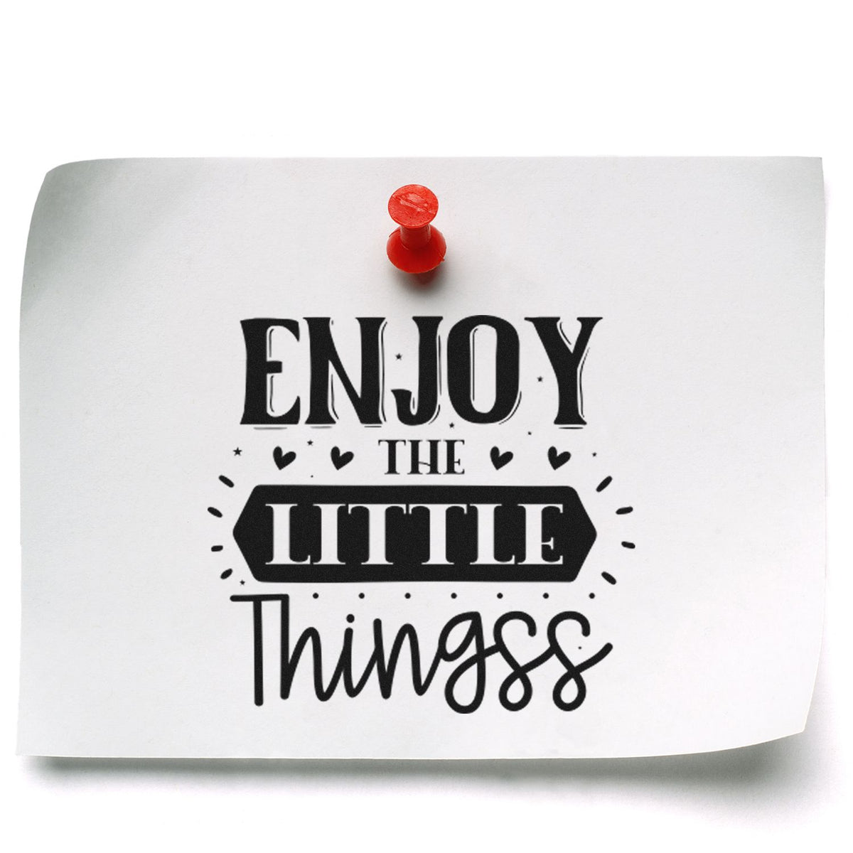 Red seal stamp pins a white note printed with black Enjoy the Little Things lettering.