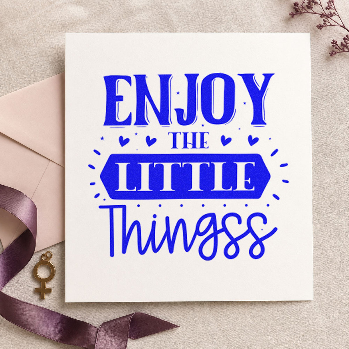 Enjoy The Little Things Hearts craft stamp in blue ink on cardstock, an easy option for child apron printing.