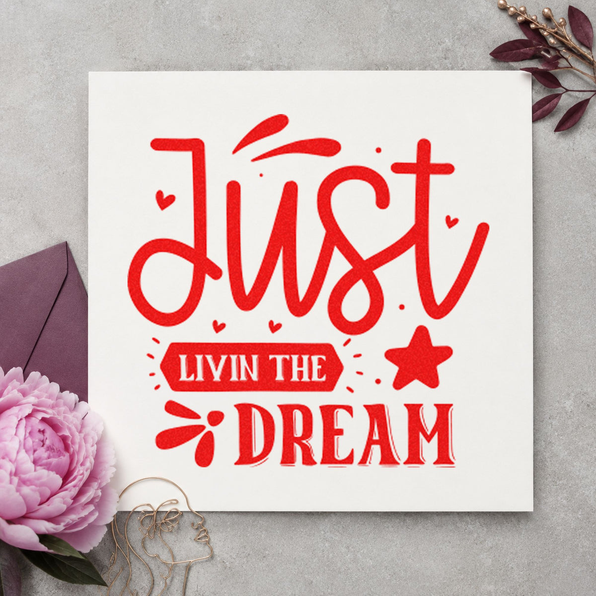 Just Livin The Dream Star rubber stamp shown in red ink, stamped for projects such as slip number labels.