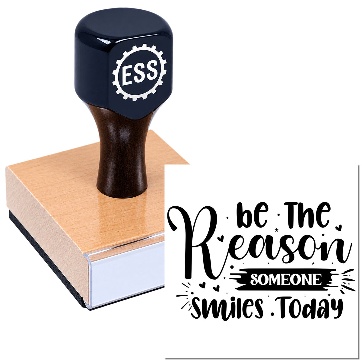 Dark blue ESS custom rubber stamp on a pink wooden block with a "Be the Reason Someone Smiles Today" seal design.