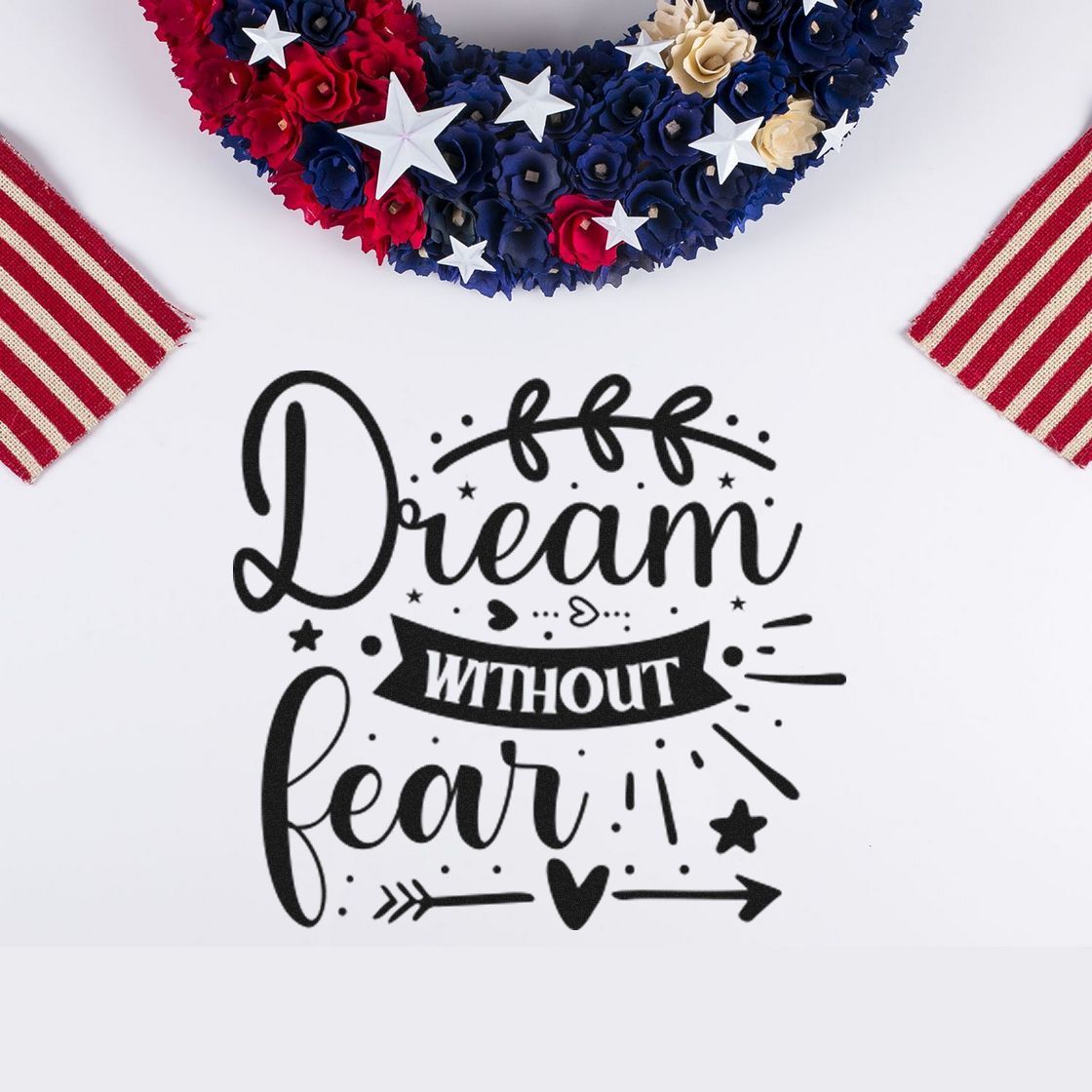 Decorative stamp and seal design reading Dream Without Fear with navy, red and cream stars and striped patriotic accents.