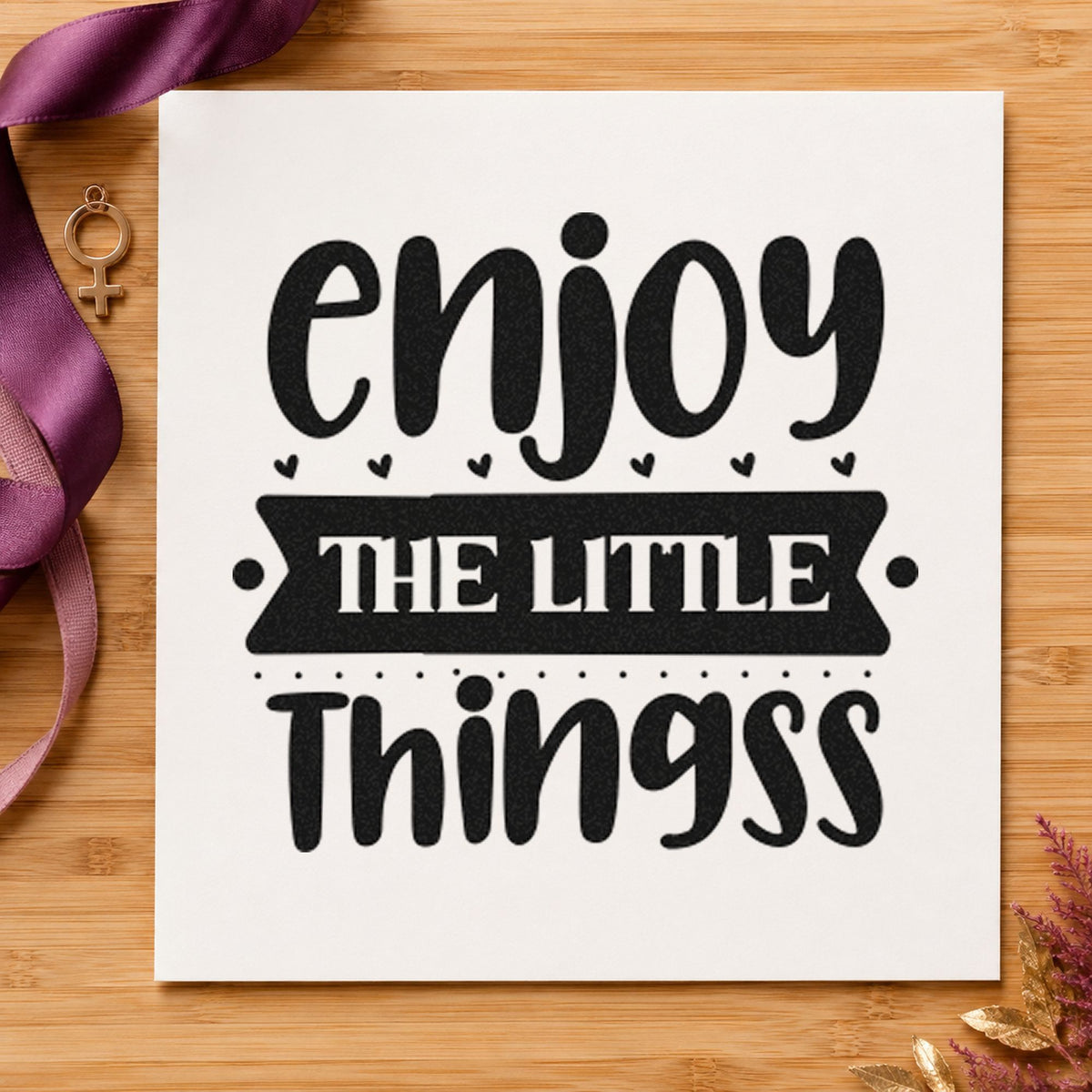 Enjoy The Little Things Bold craft stamp imprint in black ink on a handmade project, one idea being coin sleeve gift tags.