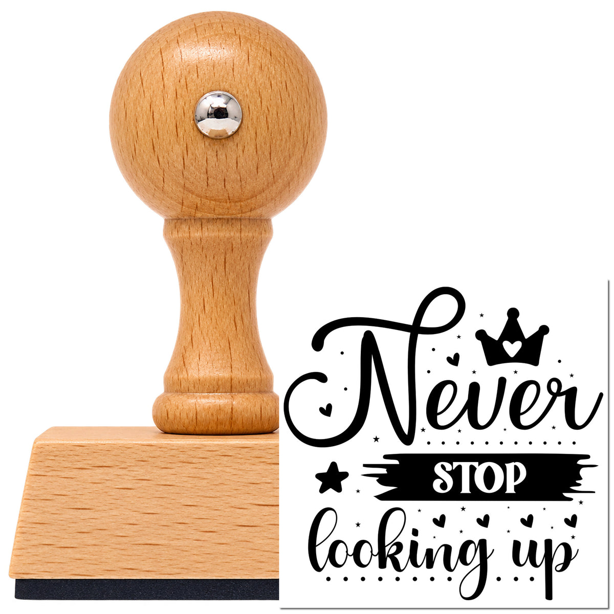 Vintage Pro beech wood stamp with a round knob handle, shown with its black Never Stop Looking Up Crown imprint on white.