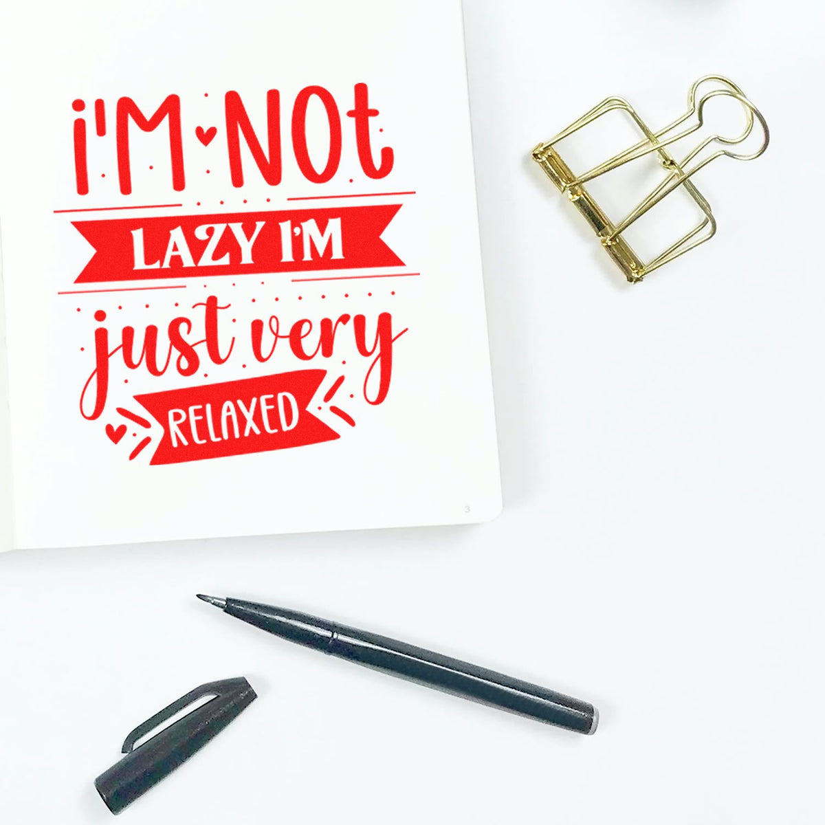 Not Lazy Just Very Relaxed rubber stamp shown in red ink, stamped for projects such as slow sunday album page.
