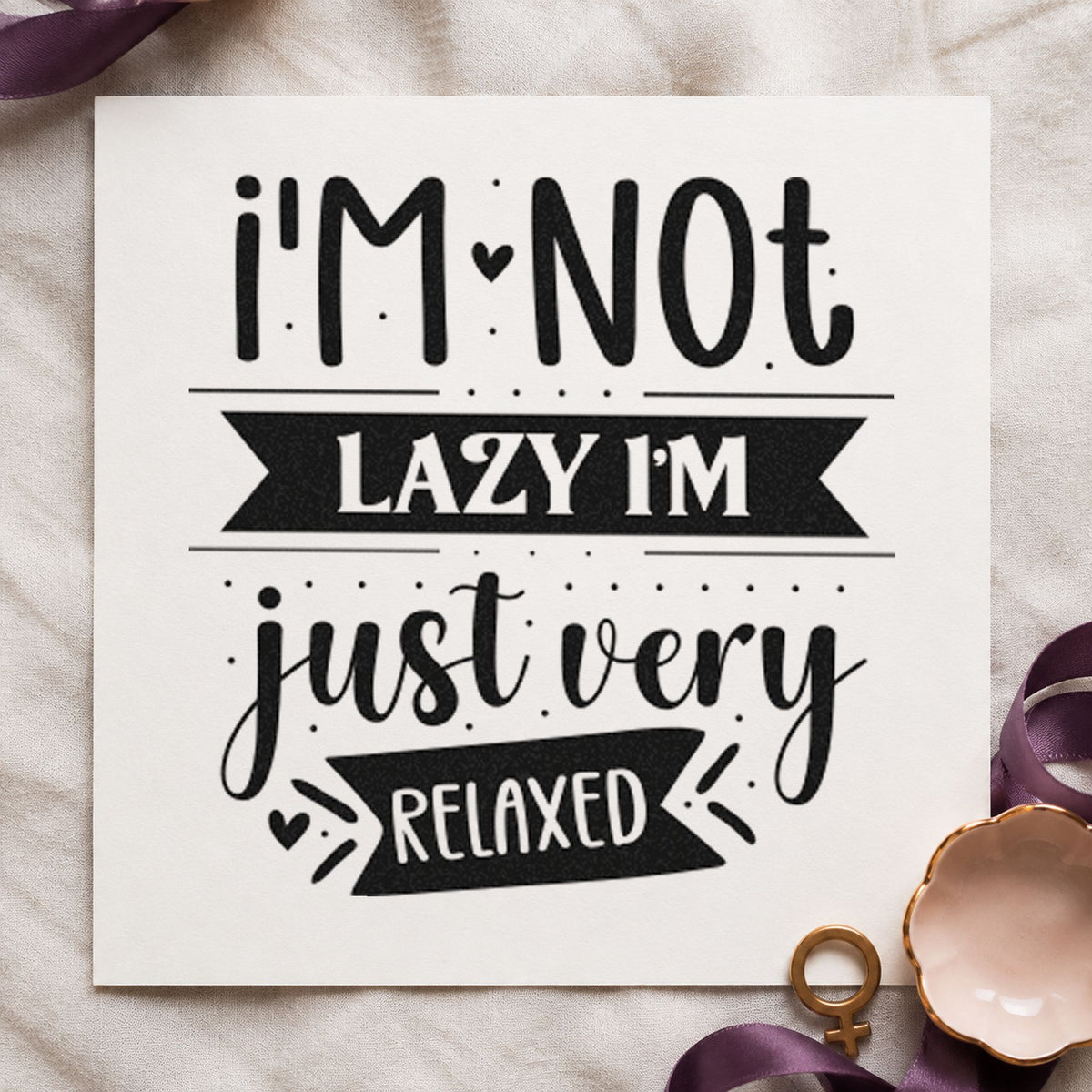 Not Lazy Just Very Relaxed craft stamp imprint in black ink on a handmade project, one idea being comfort gift tags.