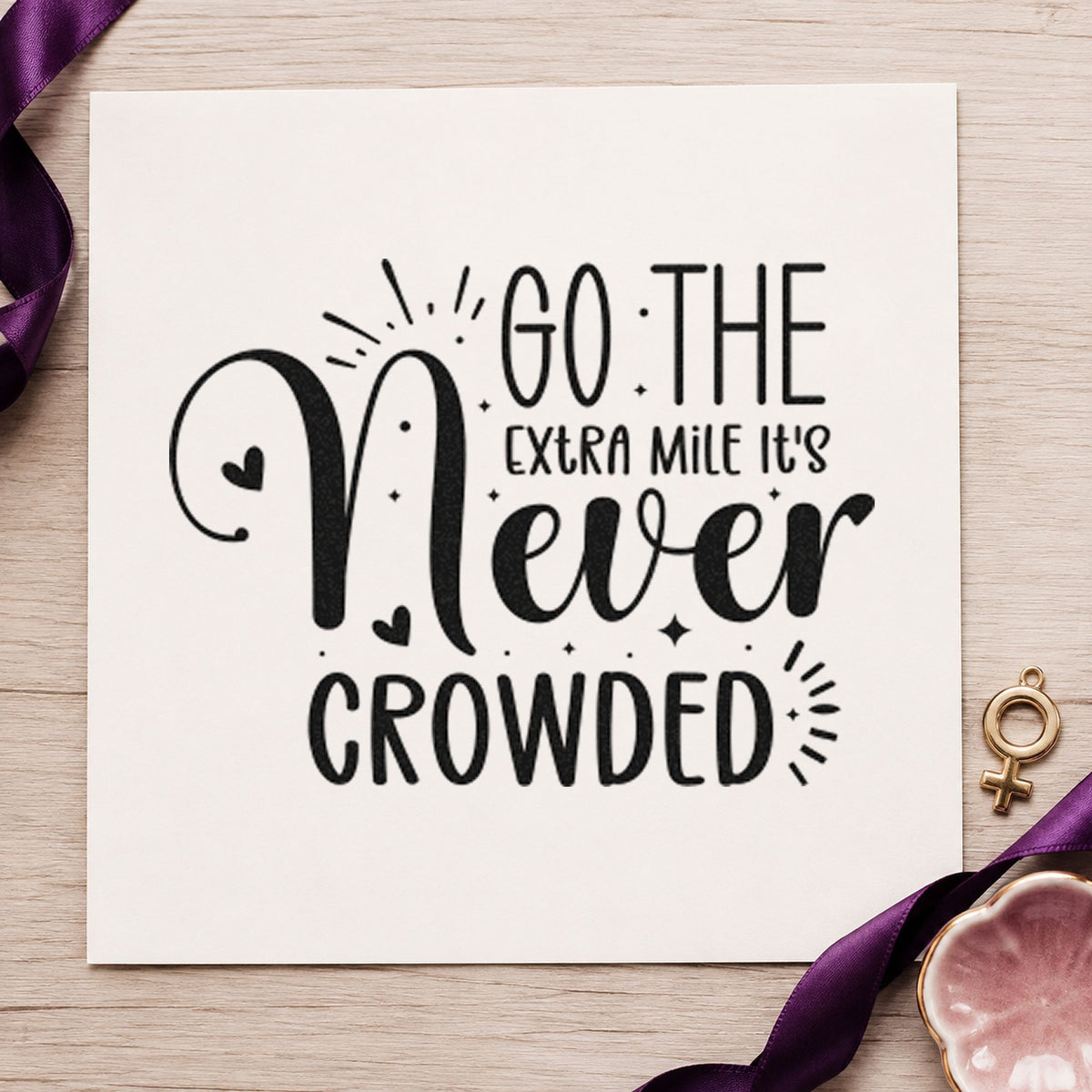 Go Extra Mile Never Crowded craft stamp imprint in black ink on a handmade project, one idea being packing kit gift tags.