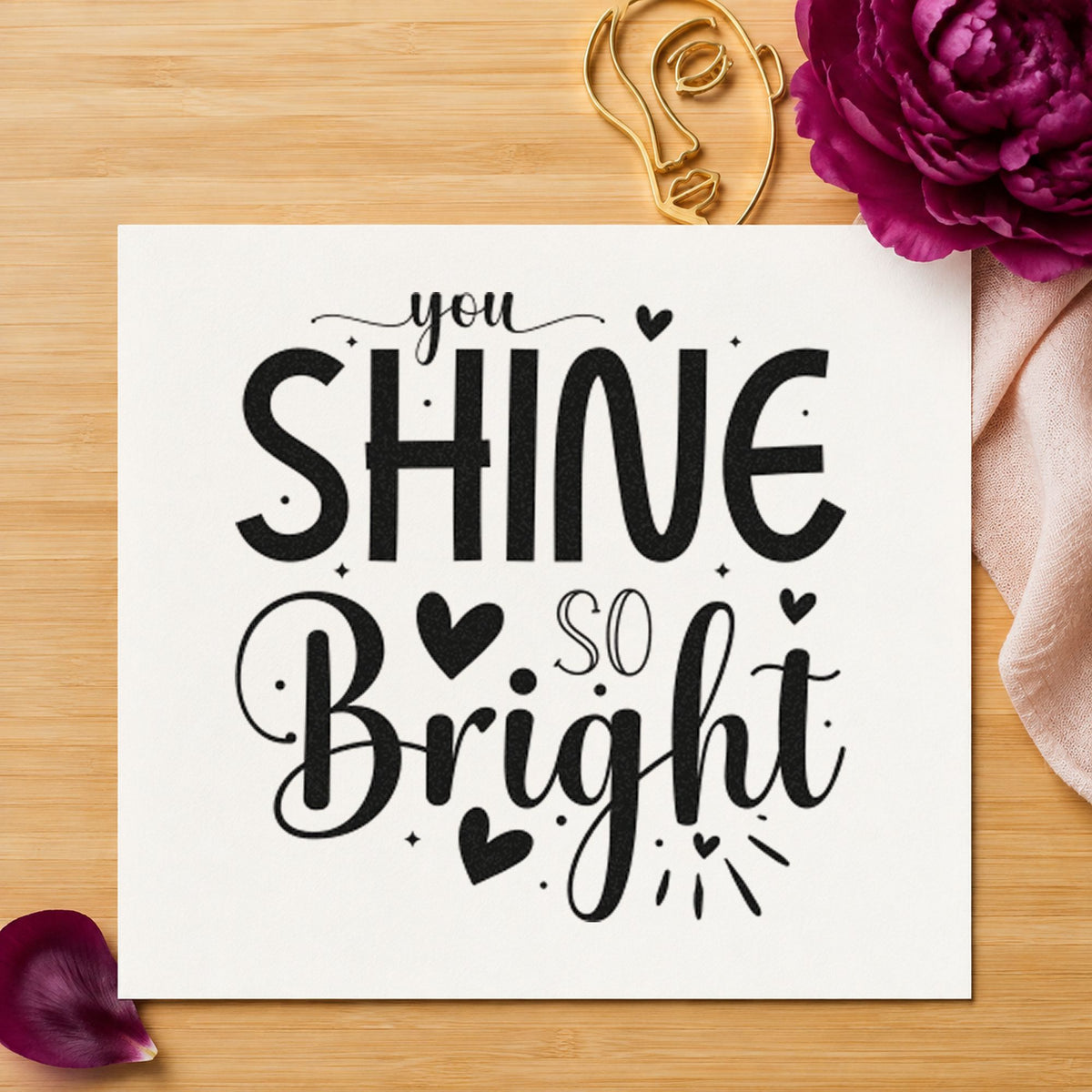 You Shine So Bright craft stamp imprint in black ink on a handmade project, one idea being corsage gift tags.