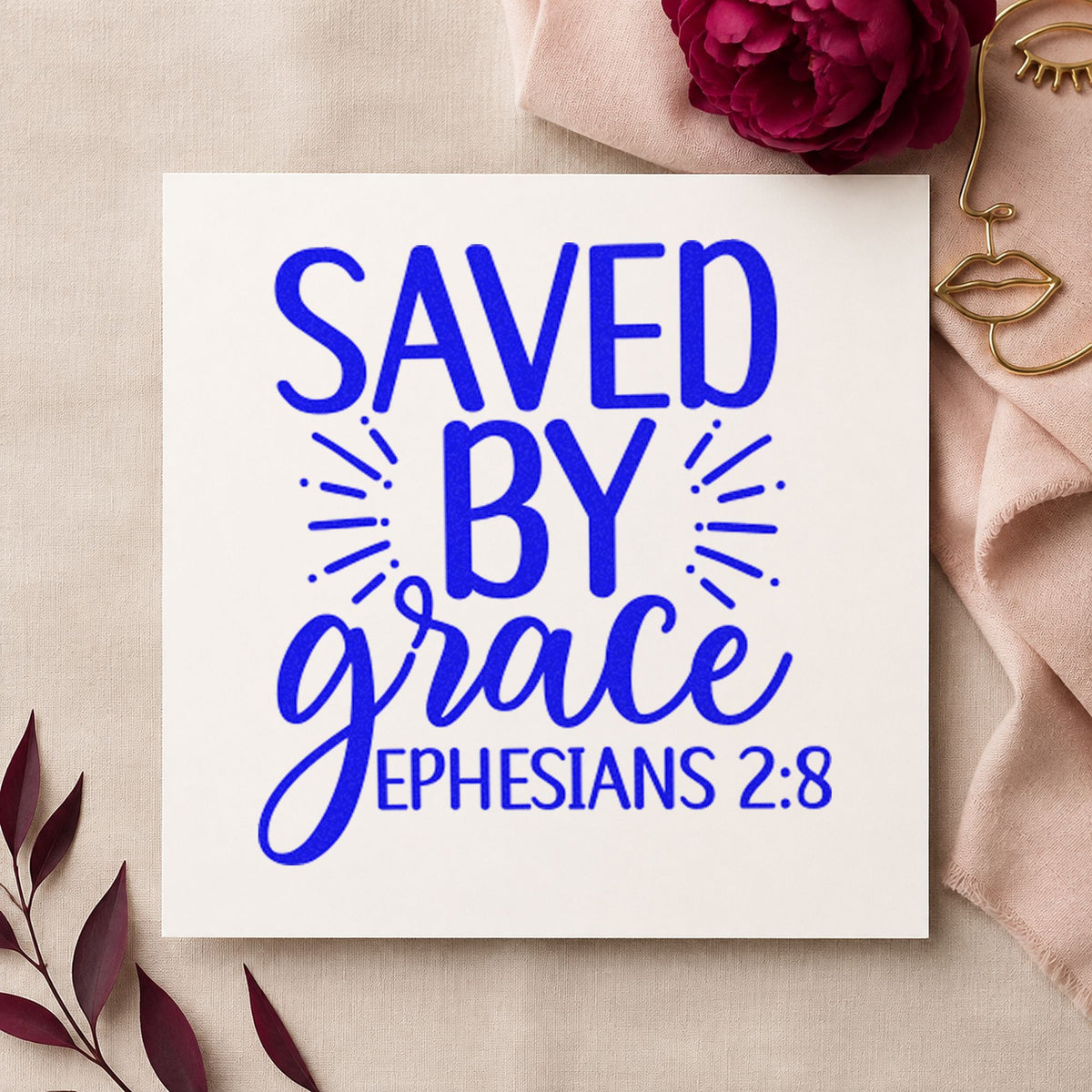 Saved By Grace Ephesians craft stamp in blue ink on cardstock, an easy option for greeter scarf printing.