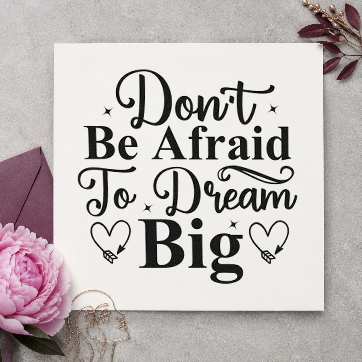 Don't Be Afraid Dream Big craft stamp imprint in black ink on a handmade project, one idea being product gift tags.