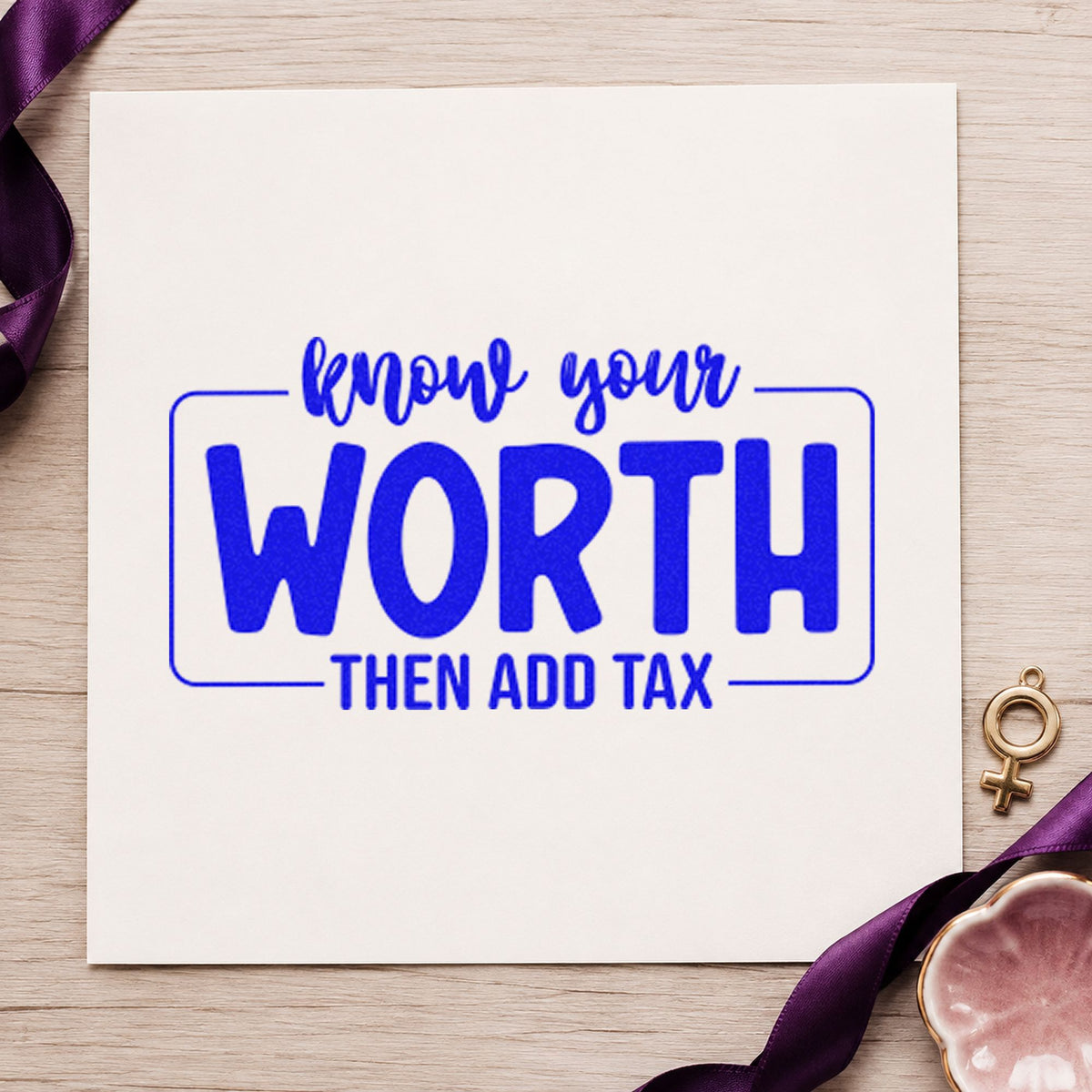 Know Your Worth Add Tax craft stamp in blue ink on cardstock, an easy option for brush roll printing.