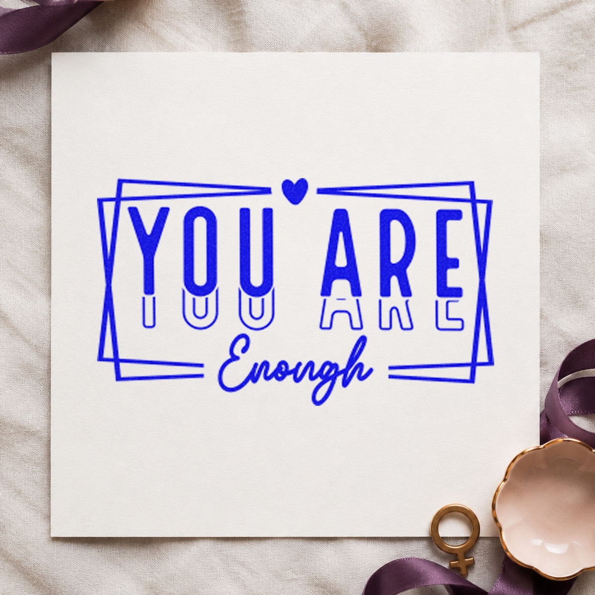 You Are Enough Layered Frame craft stamp in blue ink on cardstock, an easy option for chair pocket printing.