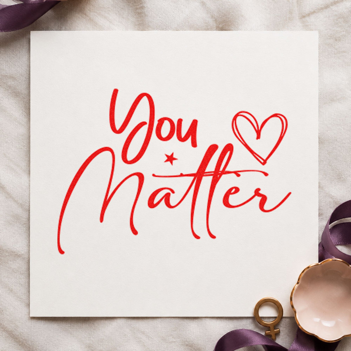 You Matter Heart Star craft stamp imprint in red ink on a handmade project, one idea being check in cards.