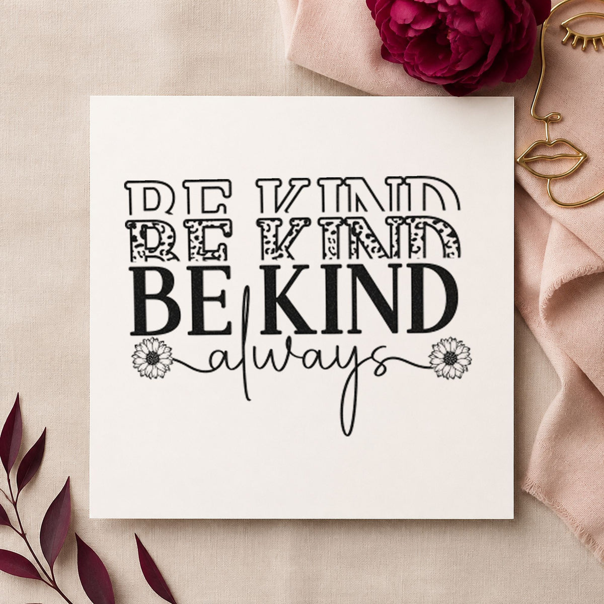 Be Kind Always Repeated craft stamp imprint in black ink on a handmade project, one idea being treat bag gift tags.