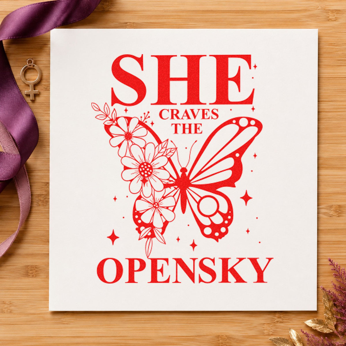 She Craves The Open Sky craft stamp imprint in red ink on a handmade project, one idea being site brief cards.