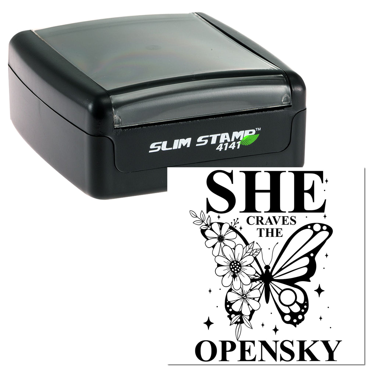 Black slim self-inking stamp with gray lid and custom butterfly floral seal reading SHE CRAVES THE OPENSKY.