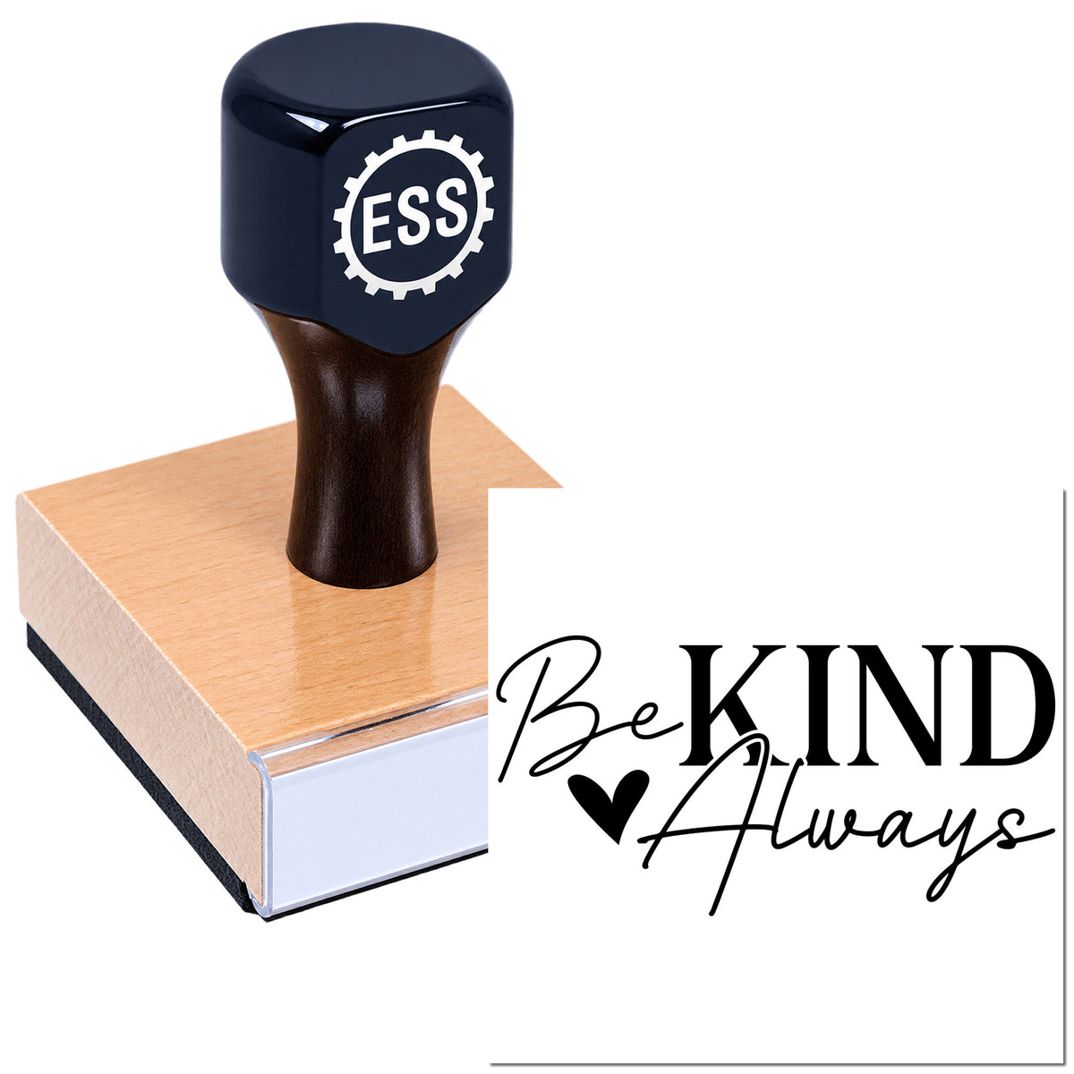 Black ESSI stamp seal on wooden block, printed with Be KIND Always text and heart design.