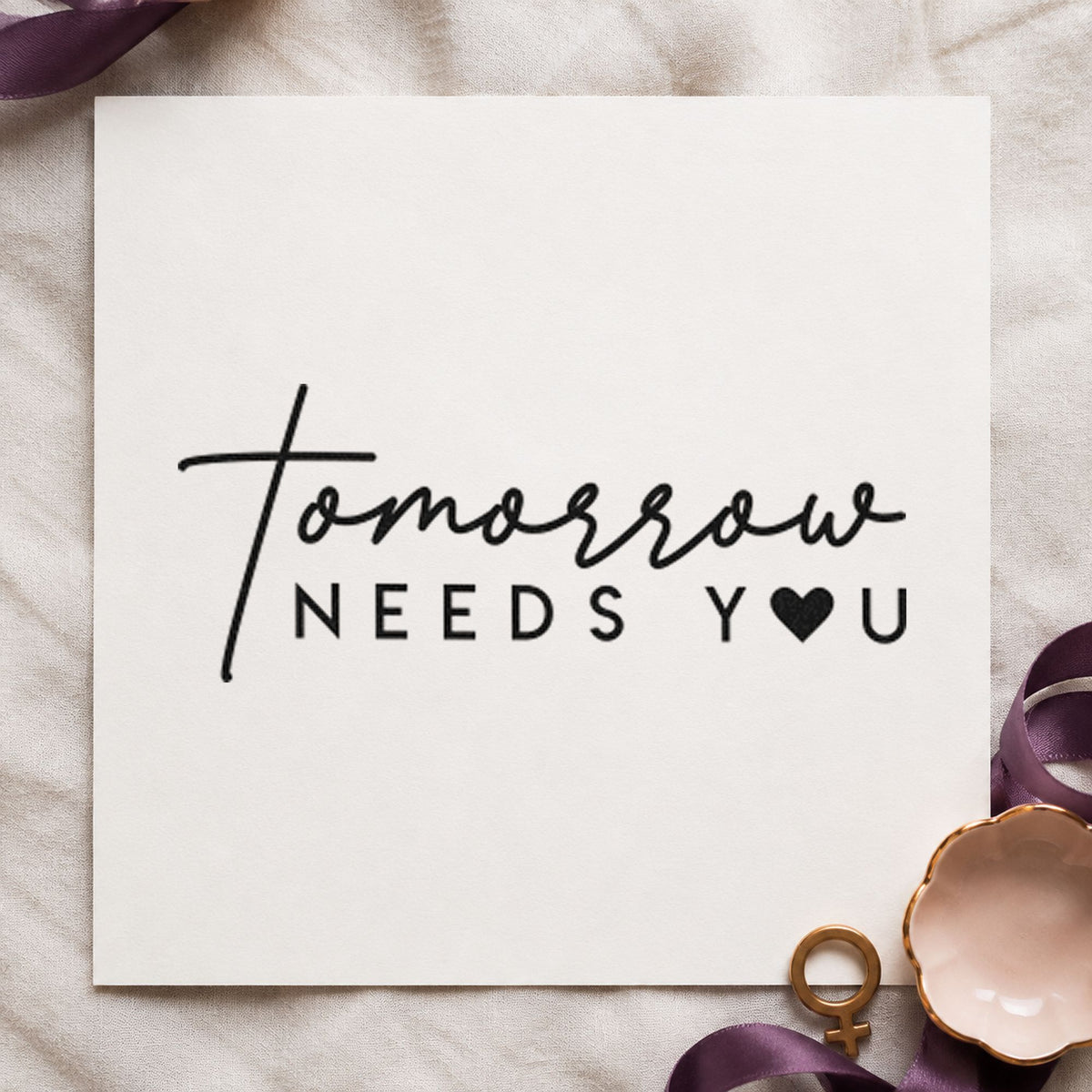 Tomorrow Needs You Heart craft stamp imprint in black ink on a handmade project, one idea being seedling gift tags.