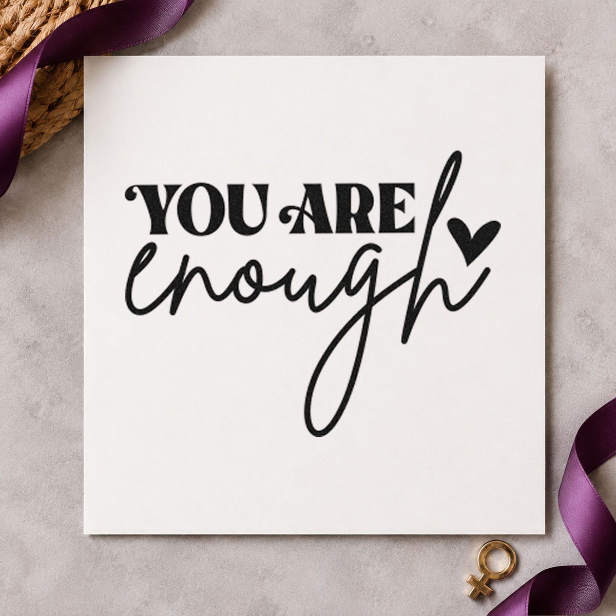 You Are Enough Heart craft stamp imprint in black ink on a handmade project, one idea being welcome kit gift tags.