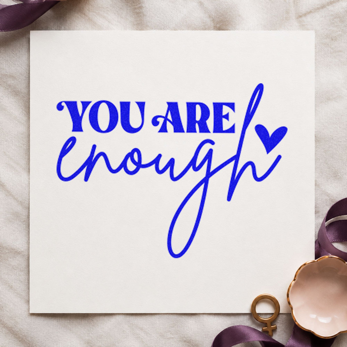 You Are Enough Heart craft stamp imprinted in blue ink on paper, a design suited to framed desk shelf.