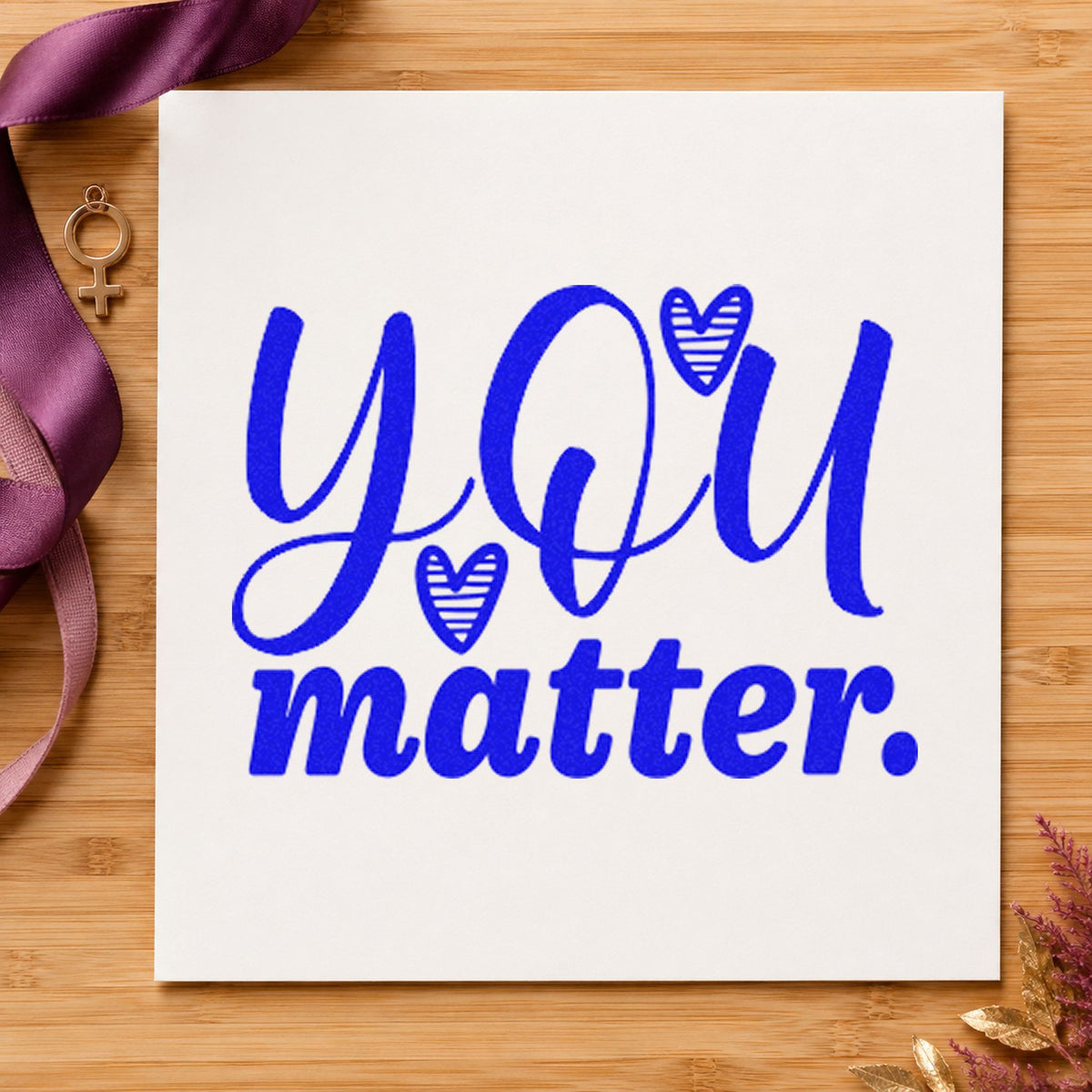 You Matter Striped Hearts craft stamp imprinted in blue ink on paper, a design suited to framed youth room.