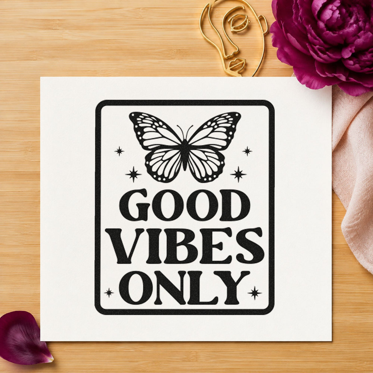 Good Vibes Only Butterfly craft stamp imprint in black ink on a handmade project, one idea being locker gift tags.