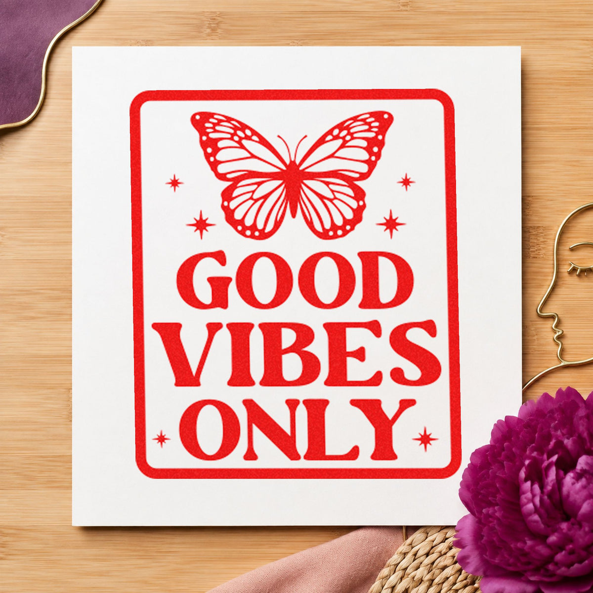 Good Vibes Only Butterfly craft stamp imprint in red ink on a handmade project, one idea being note swap cards.
