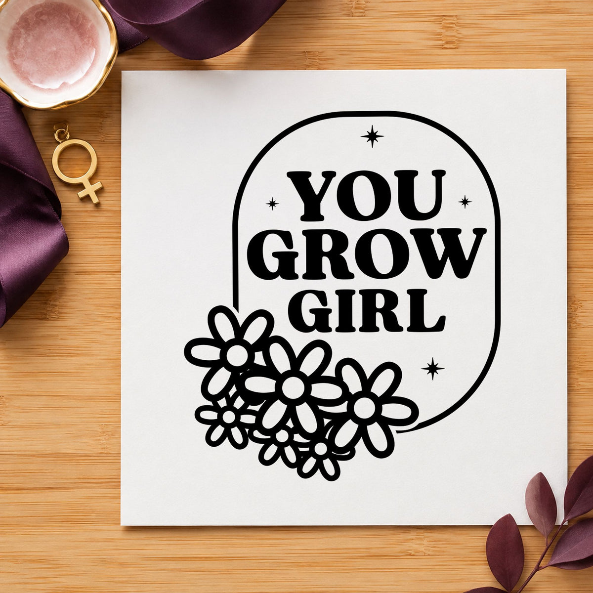 You Grow Girl Flowers craft stamp imprint in black ink on a handmade project, one idea being seedling pot tags.