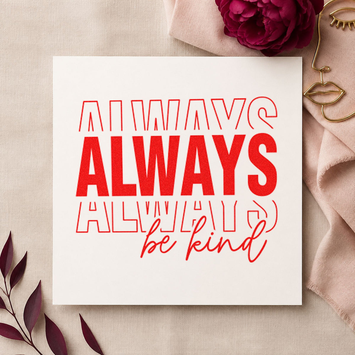 Always Be Kind Lettering craft stamp imprint in red ink on a handmade project, one idea being driver brief cards.
