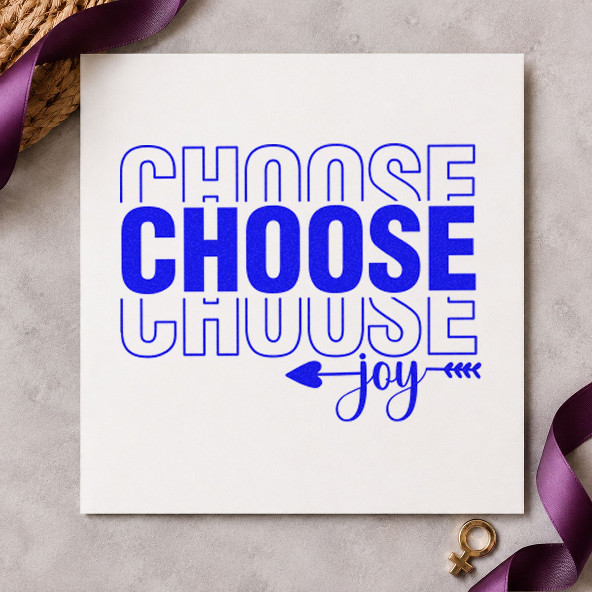 Choose Joy Repeated Lettering craft stamp in blue ink on cardstock, an easy option for stocking cuff printing.