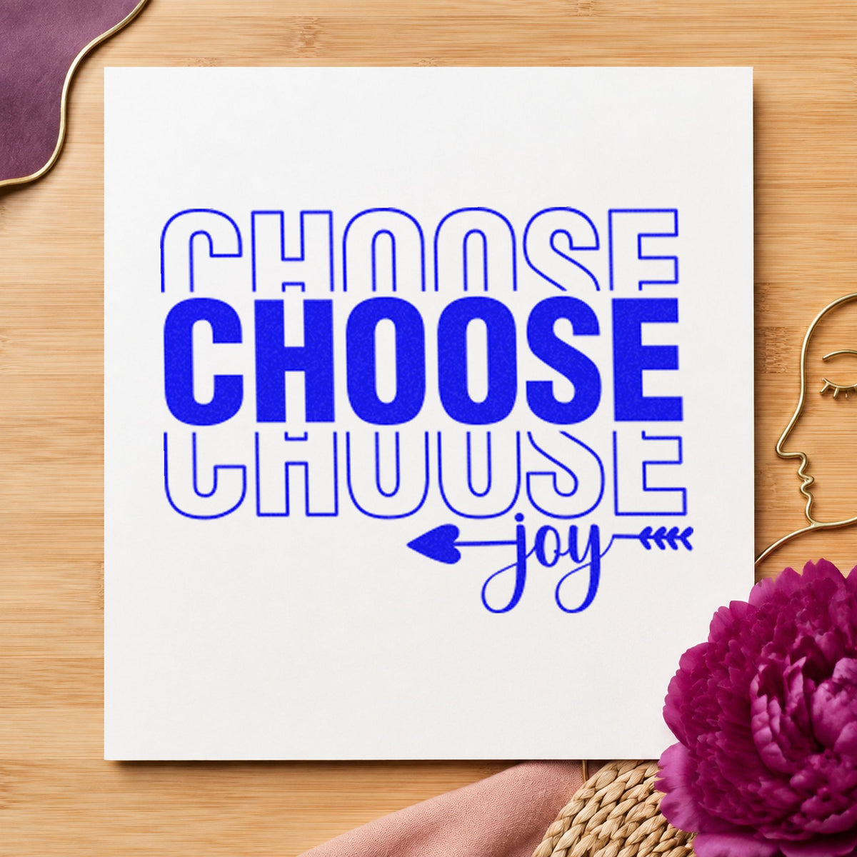 Choose Joy Repeated Lettering craft stamp imprinted in blue ink on paper, a design suited to framed mantel ledge.