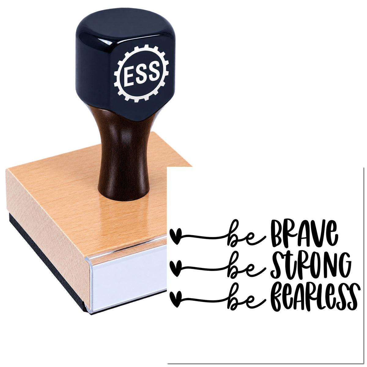 Black ESS rubber stamp on a pink wooden block beside a white seal reading "be brave be strong be fearless."