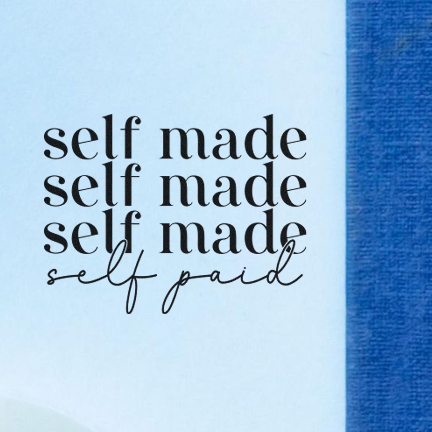Black self-made and self-paid stamp/seal on light blue background with a blue edge.