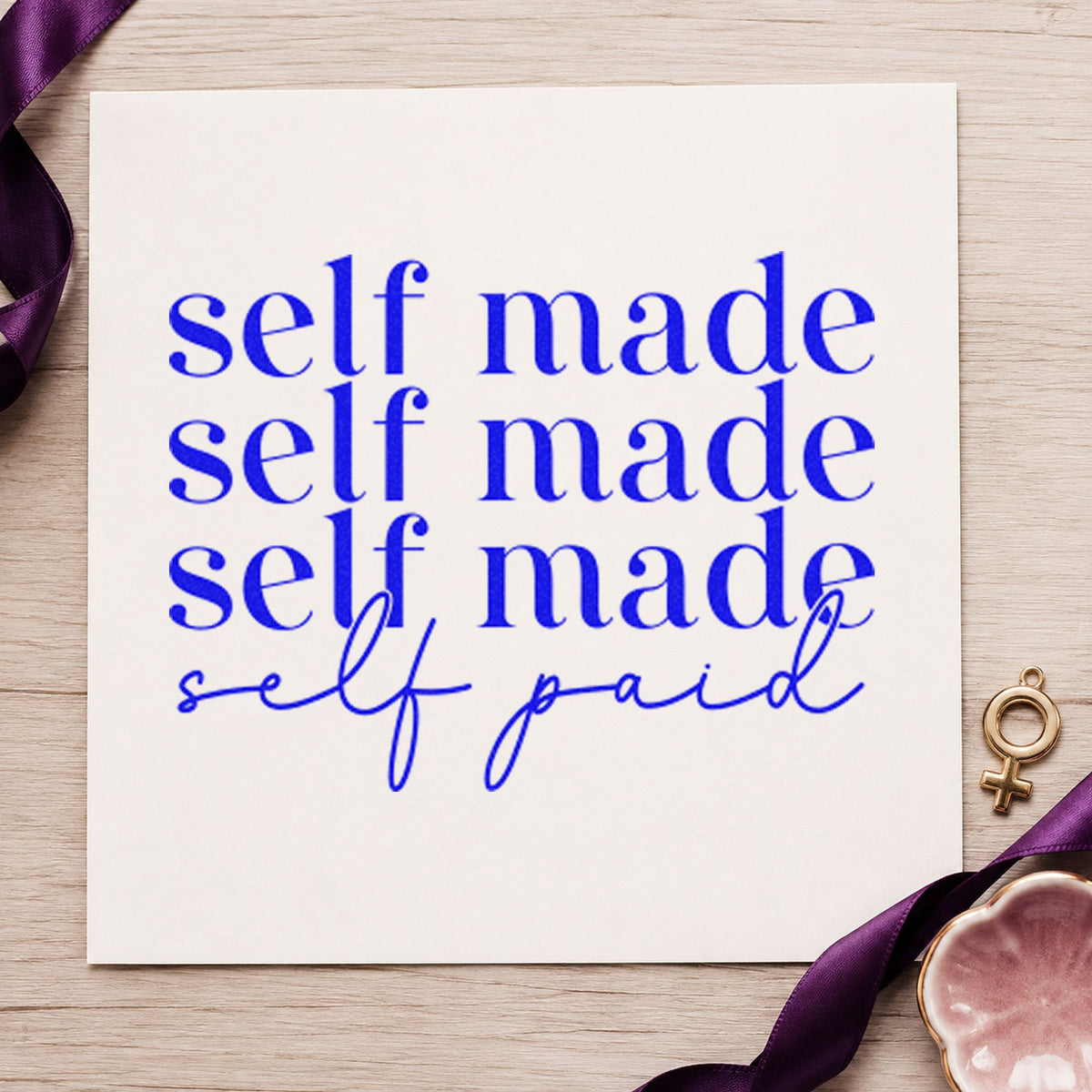 Self Made Self Paid craft stamp in blue ink on cardstock, an easy option for carry bag printing.