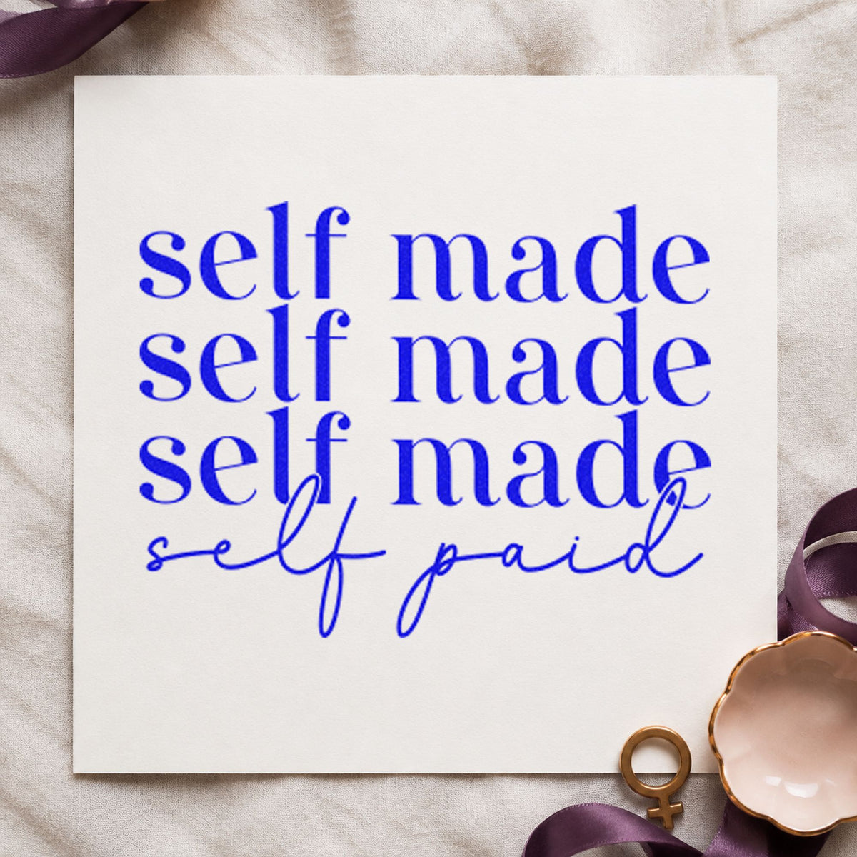 Self Made Self Paid craft stamp imprinted in blue ink on paper, a design suited to framed storage unit.