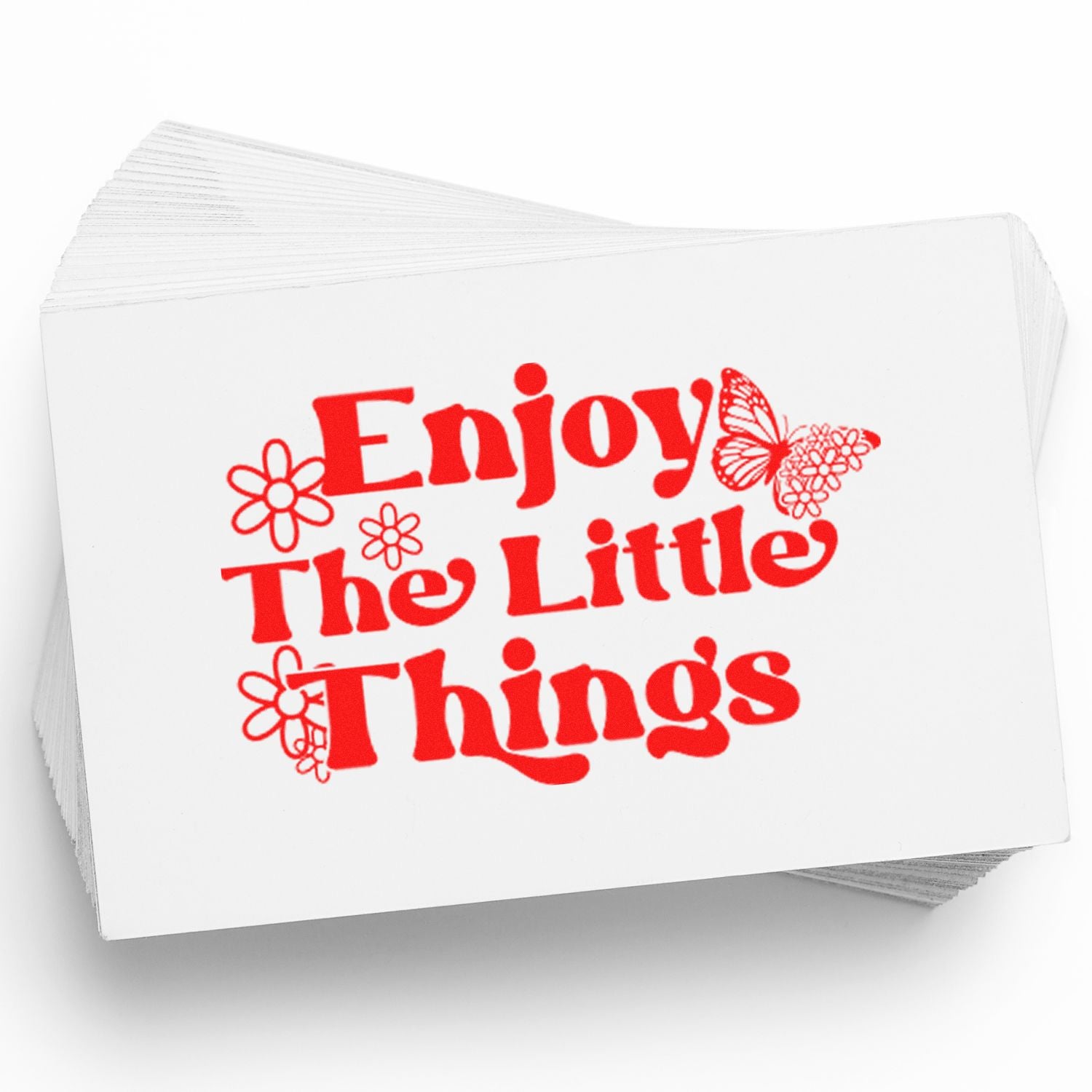 Stack of white stamp and seal cards with bright red Enjoy The Little Things text, flowers, and butterfly.