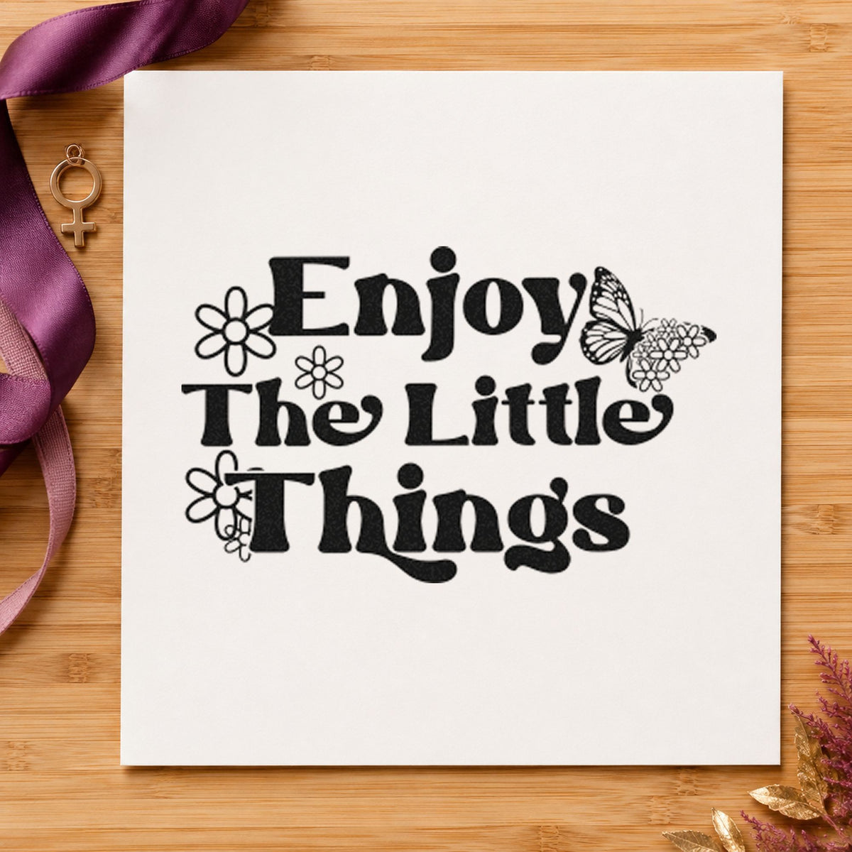 Enjoy The Little Things craft stamp imprint in black ink on a handmade project, one idea being loose leaf gift tags.