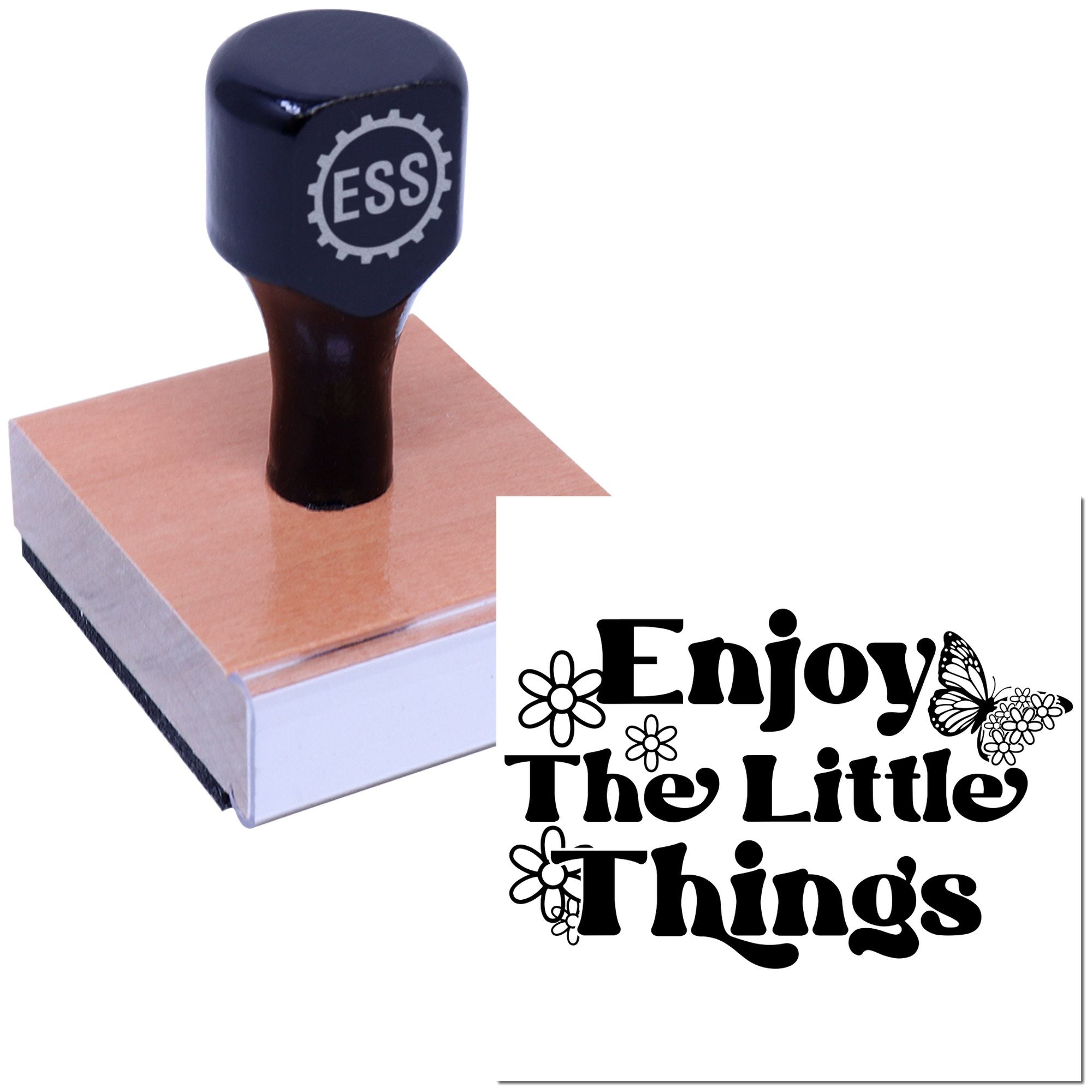 Custom stamp and seal with black handle, pink wood base, and Enjoy The Little Things design with flowers and butterflies.