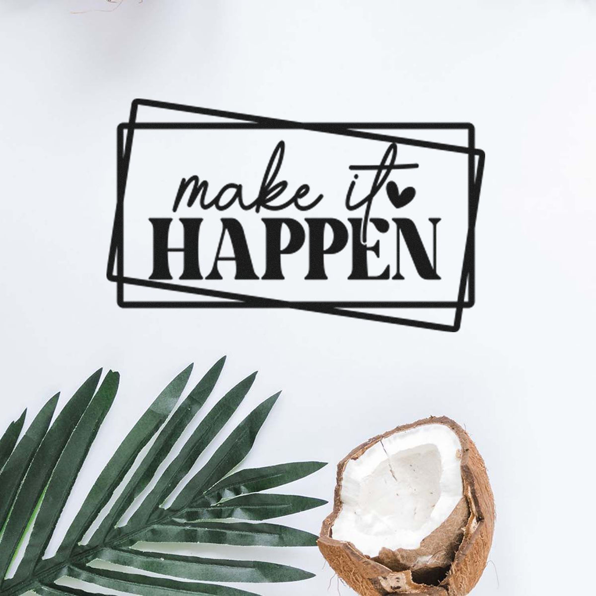 Black make it happen stamp and seal design on white, with green palm leaf and split coconut.