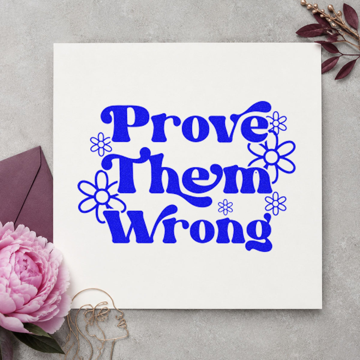 Prove Them Wrong Flowers craft stamp in blue ink on cardstock, an easy option for book bag printing.