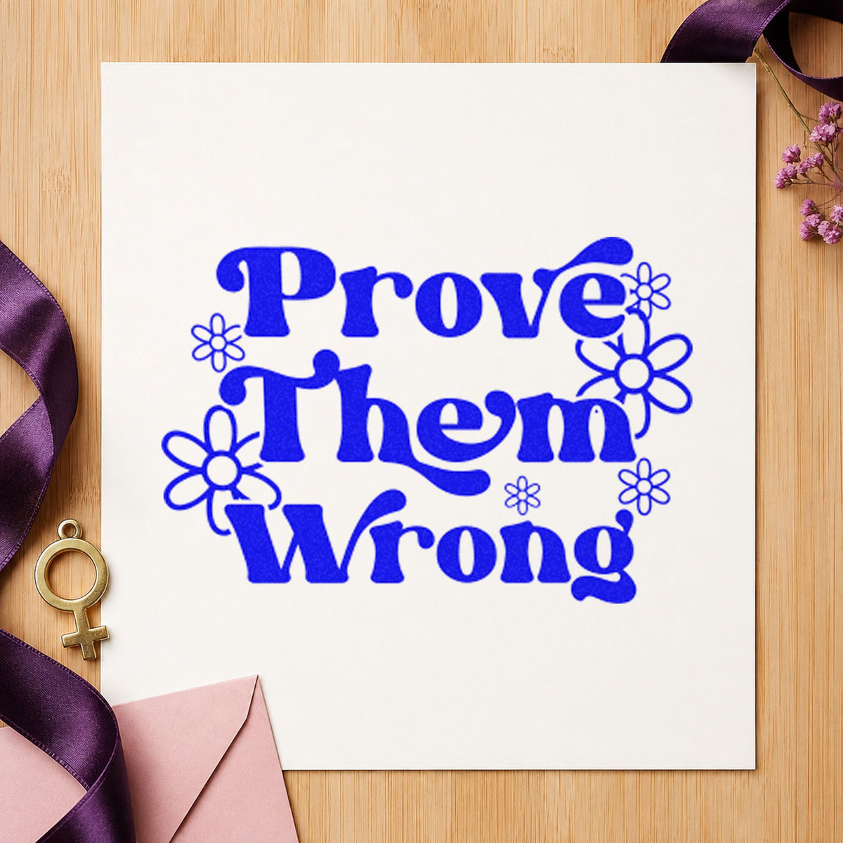 Prove Them Wrong Flowers craft stamp imprinted in blue ink on paper, a design suited to framed kitchen table.
