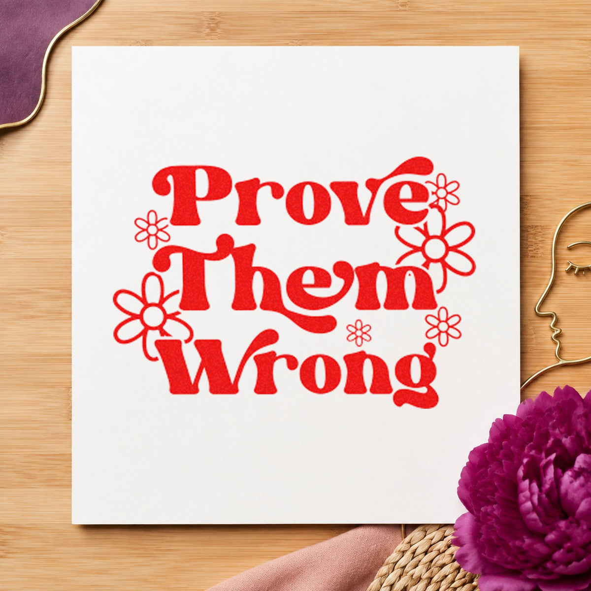Prove Them Wrong Flowers craft stamp imprint in red ink on a handmade project, one idea being assignment due cards.